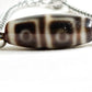 Four Eye Dzi Bead Bracelet